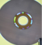 Fig 15. Light interference is noted with compact disc reflecting white light into its colors.