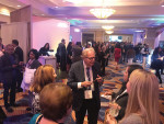 More than 700 dentists attended the Glidewell Dental Symposium, including keynote speaker Jack Hahn, DDS, pictured talking to other attendees.