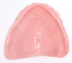 Fig 34. The 3D printed denture bases and teeth assembled for the maxillary and mandibular digital dentures.