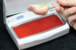 Figure 15  The custom base plate is created by dipping the custom rugae in liquid wax.