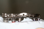 Figure 2  A prototypical Montreal-style SRH bar with a convex, mirror-polished intaglio surface. Note that bar interfaces with two different implant systems and three different platforms on the same arch.