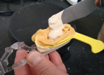 Figure 4 Invert the articulator and pour the opposing base and impression.