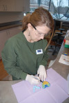Figure 5. Technician receiving and sorting laboratory cases.