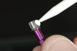 Figure 11 An opaque shade of self-curing/light-curing option resin implant cement was applied to the titanium abutment base.