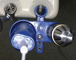Figure 2 In this view from above the digit power™ Dispenser, note that the adapter sits in the tool holder and permits the air switch on the dental unit to be activated. In this position, the Dispenser is active and material can be dispensed by stepping on the rheostat.