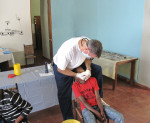 Figure 1 Dr. Serio treating a young patient.