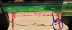 Figure 13 Width of arch is measured and marked on plaster bite rim.