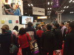 Fig 1. Attendees gather to watch a live demonstration of CAD/CAM technology at IDT | Collaboration.