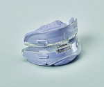 Fig 6. The patient entered a pilot study, using closely monitored oral appliance therapy rather than the usual prescription for severe cases, the use of a positive airway pressure device. He was fitted with a bruxism/sleep apnea interim oral appliance (BRX-PRO Dual Arch, Whipmix), which was designed to disclude the teeth and anteriorly reposition the mandible approximately 60%. After 1 week, the overnight home study was repeated wearing the appliance. Results showed a dramatic reduction in bruxism and a mild AHI score of 11.