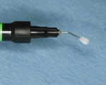 Figure 4  The screw cap was removed and the provided flocked tip was twisted onto the syringe.