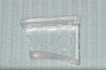 Fig 3. Clear impression tray modified for use on only the occlusal surface without interfering with rubber dam and clamp(s).