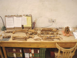 Figure 7  A human skeleton arranged in anatomic order fordata collection and recording on printed forms (photographcourtesy of the Amarna Project, Barry Kemp, Director).
