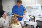 Figure 2  Collecting samples from patients in the dental office is fast, easy, and non-invasive.