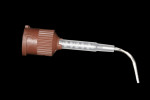 Fig 4. A bendable metal-tipped mixing tip was fixed to the dual-cure bulk composite syringe to allow more controlled access to the deepest portion of the cavity preparation.