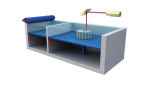 SLS is a process in which a high-powered laser beam is aimed into a powder bed to sinter a layer of the desired object.