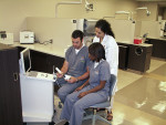 Figure 1  Students learning to image a model using CEREC.