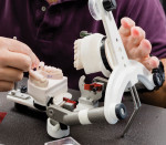 Fig 4. Mounting a model on an articulator.