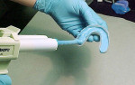 Figure 6  An automixer can be used to prepare medium- PVS impression material for syringing into an impression tray.